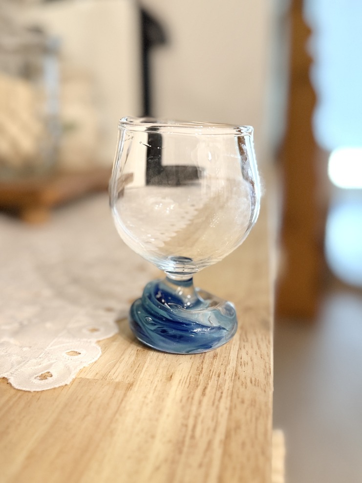 A glass piece I hand-blew, with a swirled blue base